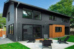Gray house with large glass doors